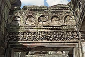 Preah Khan temple - the hall of dancers, lintel with frieze of dancing Apsaras.